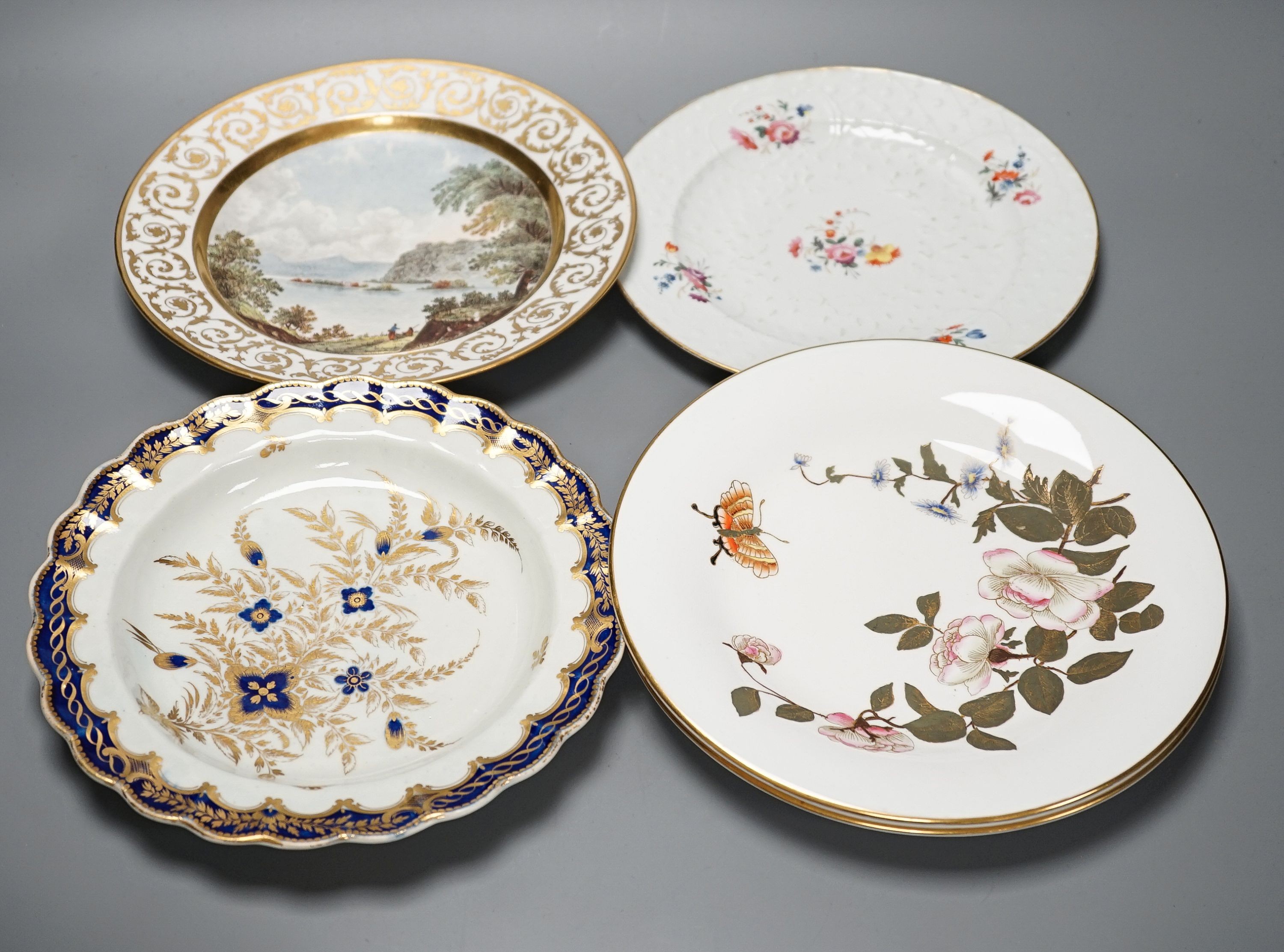 18th/19th century cabinet plates - A rare early Coalport landscape dessert plate, c.1805-10, a Coalport style plate, a Worcester blue and gilt foliate dish, c. 1790 and a pair of Royal Worcester dishes (5)